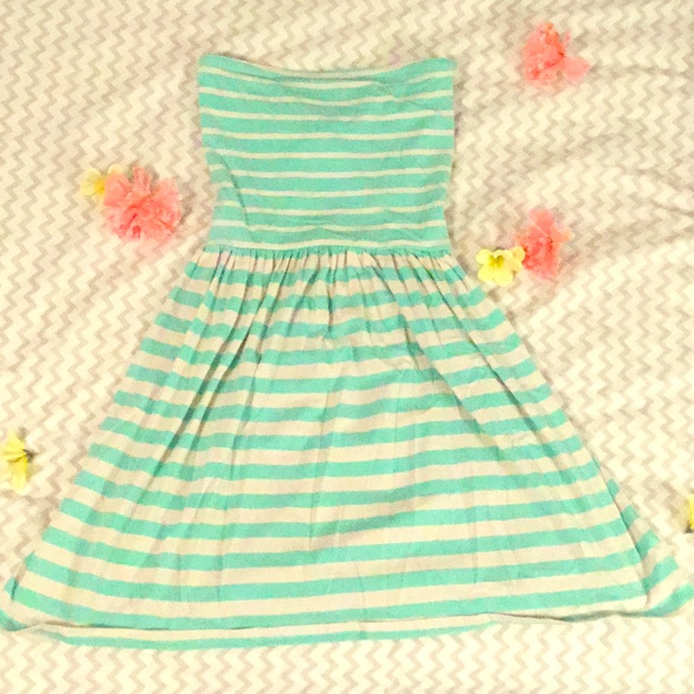 Blue and white striped sleeveless dress.